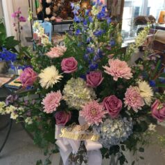 A large bouquet of flowers in a vase.