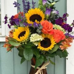 Sunflowers and orange roses