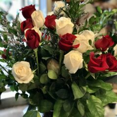 Red and White Color Roses in a Glass Vase