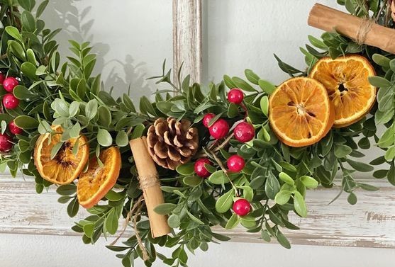 boxwood wreath with dried fruit