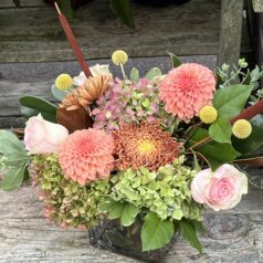 Peach and pink floral arrangement.